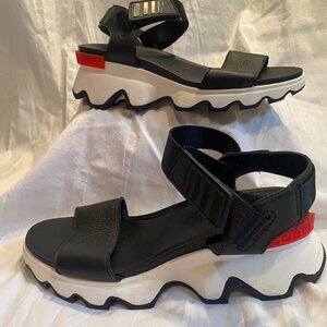 Sorel Kinetic Impact Slip-on black low comfort sandal with red detail Size 8.5